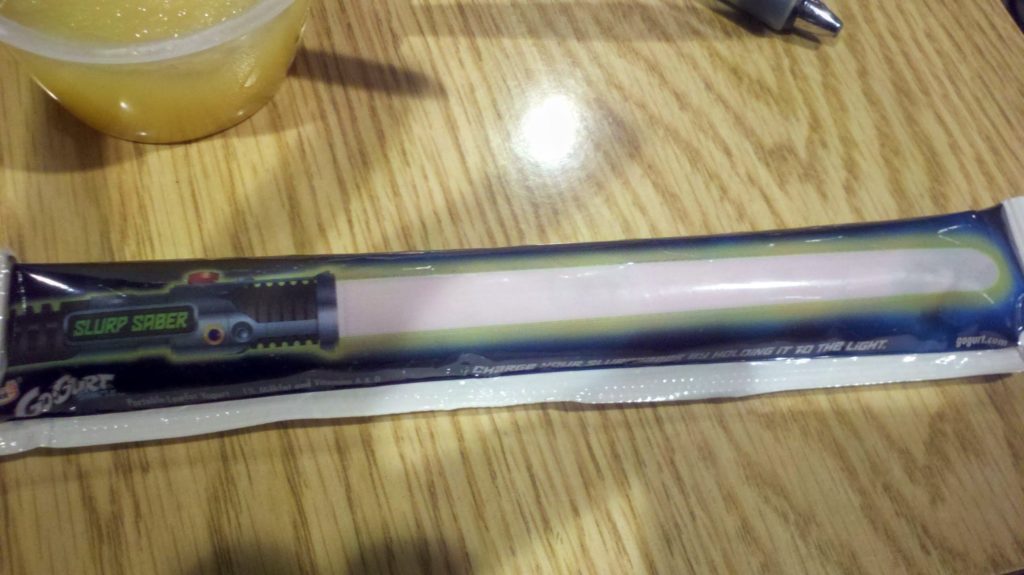 Portable yogurt package with lightsaber printing. 