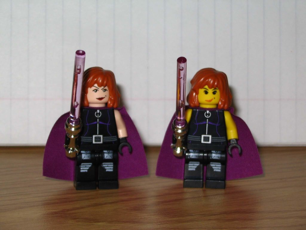 Two Lego minfigures representing Star Wars Expanded Universe character Mara Jade, including her signature purple lightsaber. 